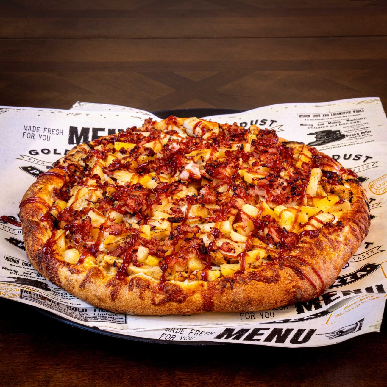 Golden coins and pizza slices celebrating customer rewards, illustrating Gold Dust Pizza's loyalty program and exclusive deals.